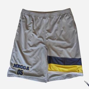 Y2K Mecca baggy basketball gray shorts with yellow, white, and navy blue vertica